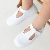 Canvas T-strap shoes in white