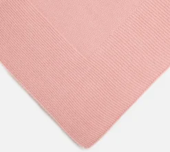 Dusty pink knitted blanket
