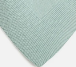 Green knitted blanket