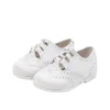 Lace up brogue shoes in white