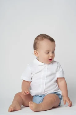Two buttons blouse. White cotton linen