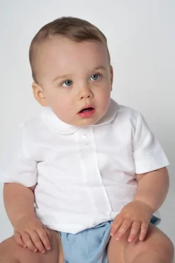 Two buttons blouse. White cotton linen